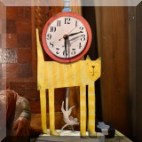 DC05. Painted metal cat clock.